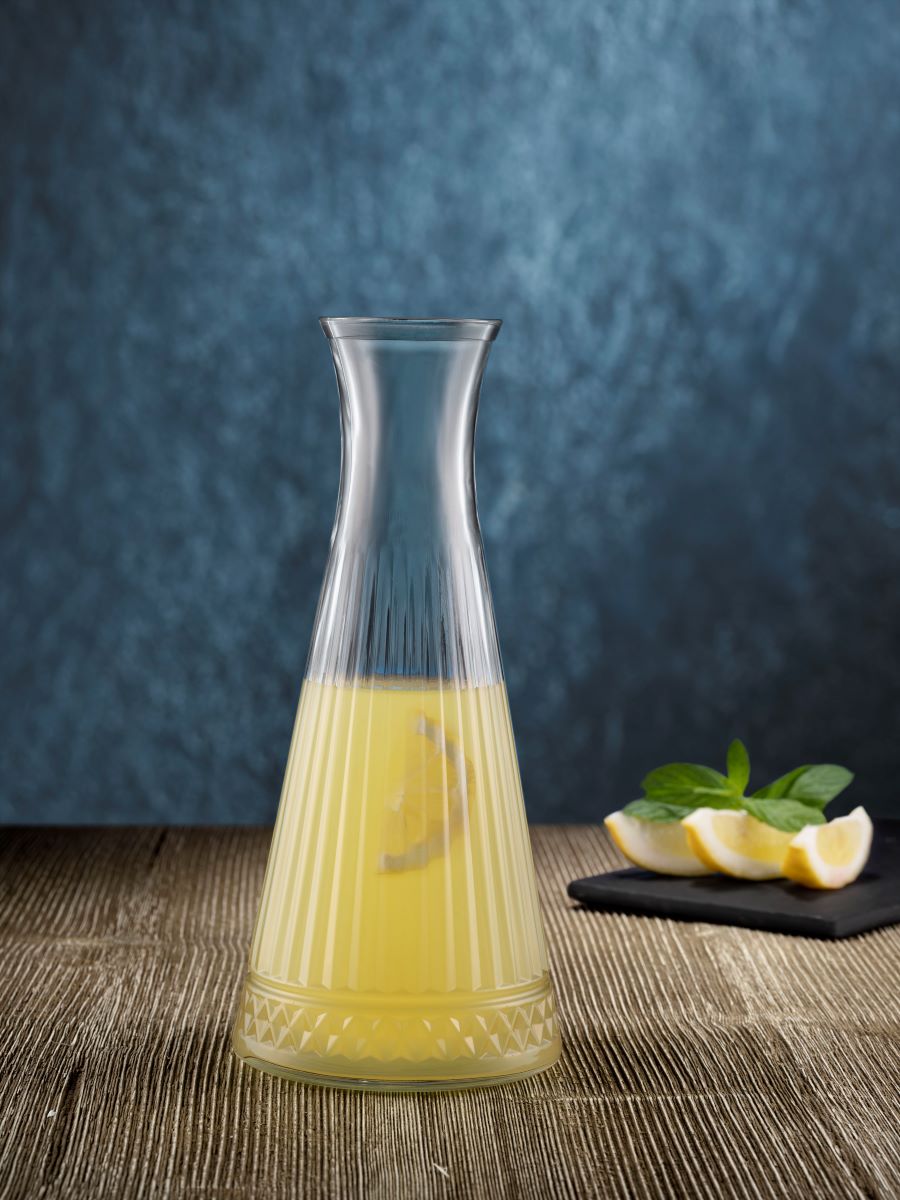 940ml carafe with orange juine on blue background