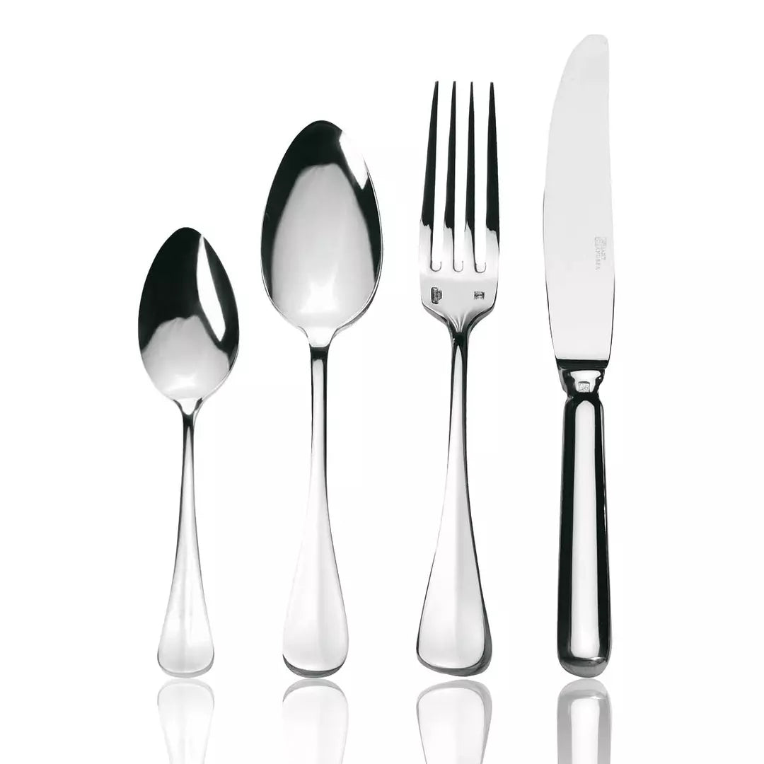 Knife, fork and two spoons cutlery set on white background