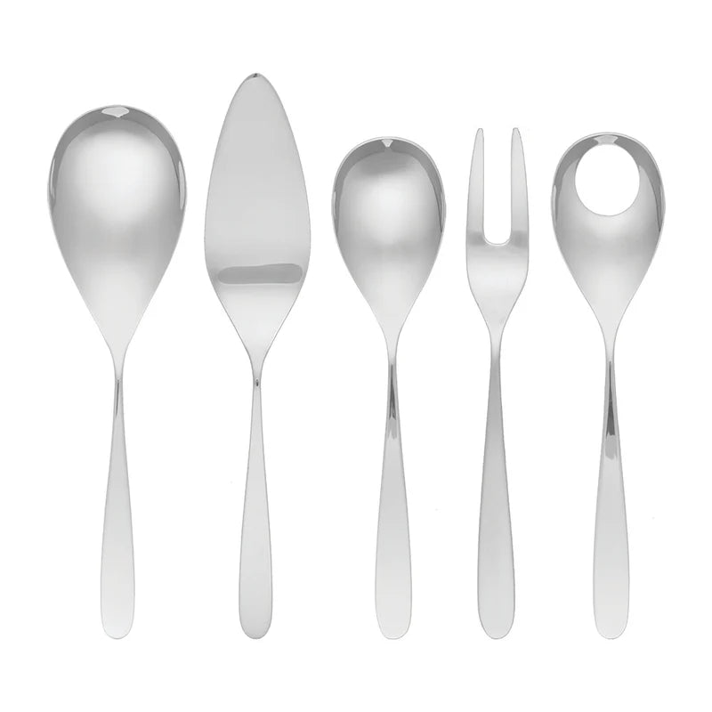 Set of silver cutlery including spoons and a fork on a white background