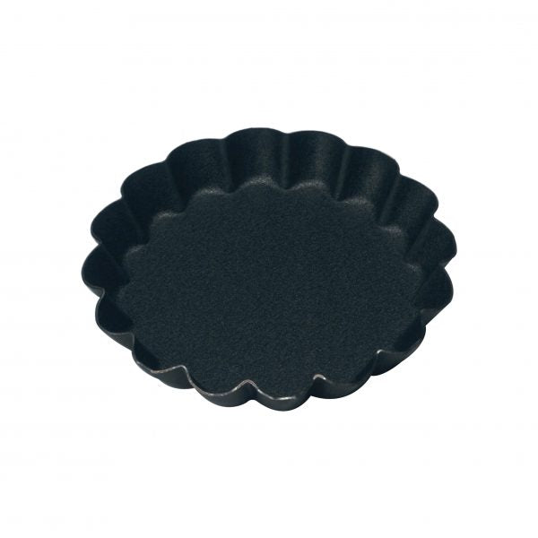 Round Fluted Tartlet Mould (Non-Stick) - 70x10mm from Guery. Non-Stick, made out of Non Stick and sold in boxes of 1. Hospitality quality at wholesale price with The Flying Fork!