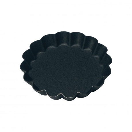 Round Fluted Tartlet Mould (Non-Stick) - 70x10mm from Guery. Non-Stick, made out of Non Stick and sold in boxes of 1. Hospitality quality at wholesale price with The Flying Fork!