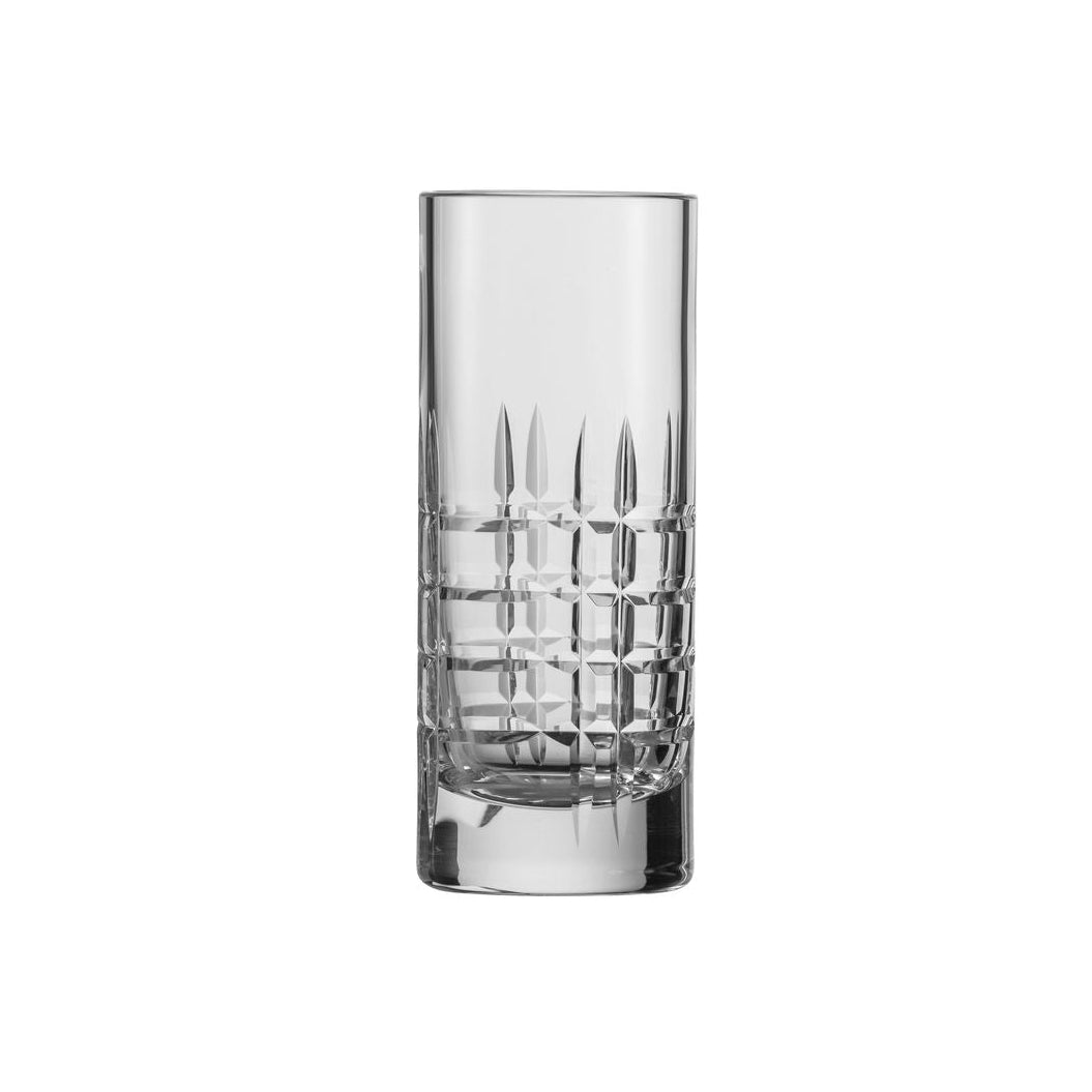 Stylish rippled long drink glass on white background