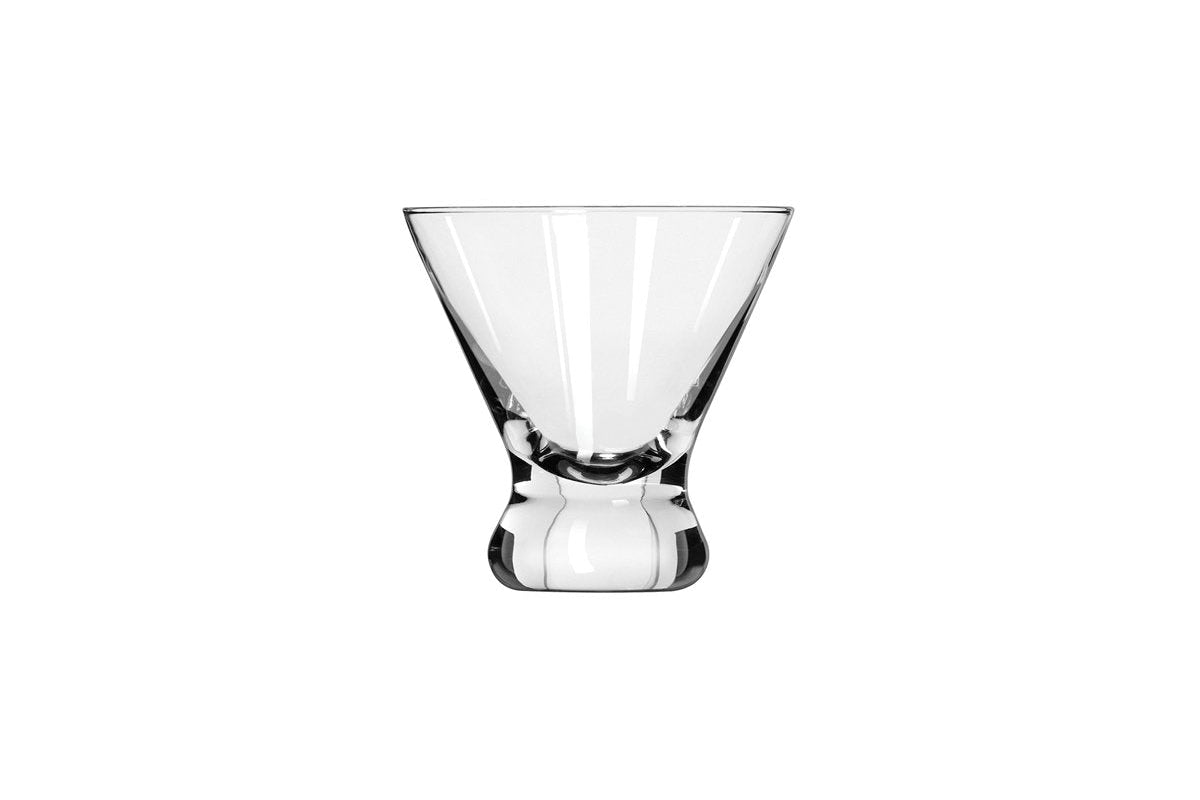 Small V-shaped martini glass on white background