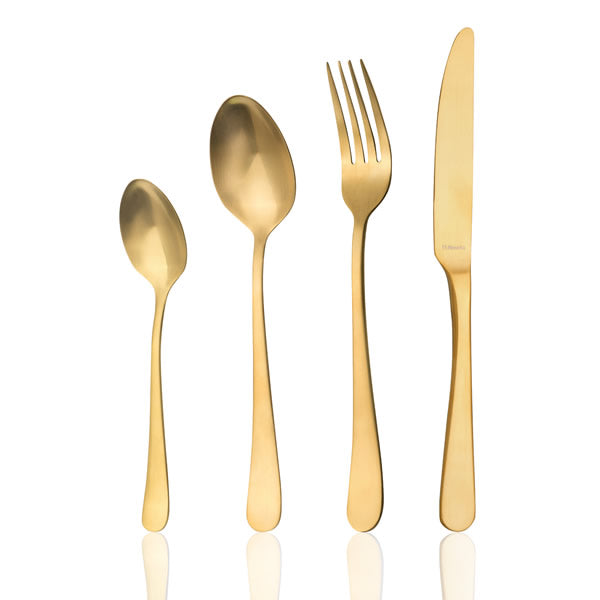 Cutlery set in gold on white background