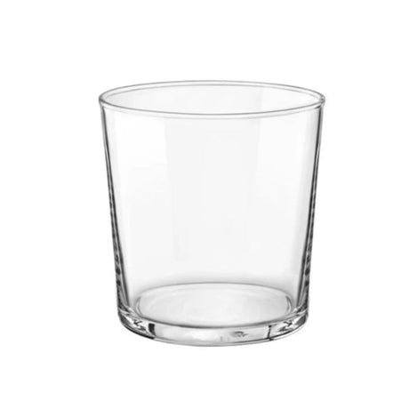 Small tumbler glass on white background