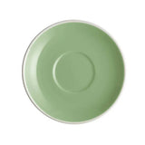 Green saucer on a white background