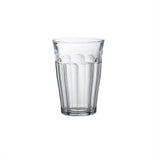 A clear glass tumbler with a textured vertical ribbed pattern, shown on a solid white background.