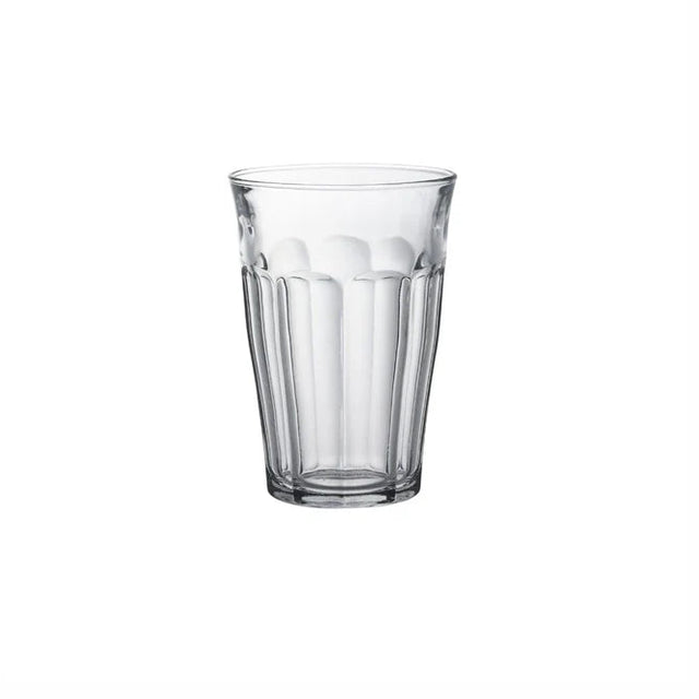 A clear glass tumbler with a textured vertical ribbed pattern, shown on a solid white background.