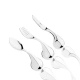 A set of polished stainless steel cutlery with a modern curved handle design, including a spoon, fork, and knife, arranged diagonally on a plain white background.