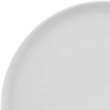 Close-up of a white ceramic plate on a white background