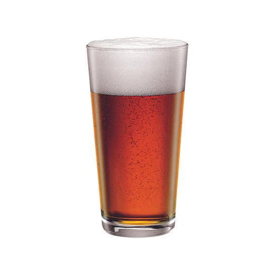 Clear glass filled with amber liquid on a white background