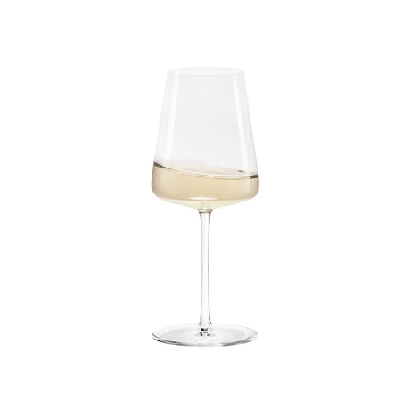Clear wine glass with white wine on a white background