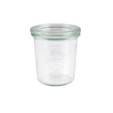 Medium sized glass jar with lid presented on a white background