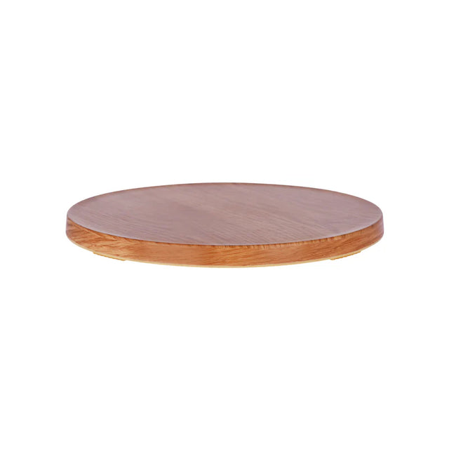 Round wooden cutting board with pinkish-brown top and brown edge on a white background