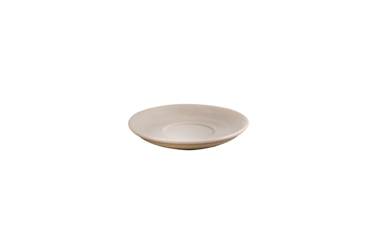 A beige porcelain saucer isolated on a white background.