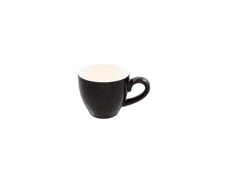 A traditional espresso coffee cup in a matte black finish on white background