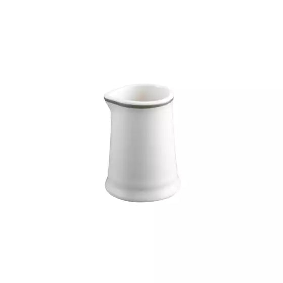 A small white ceramic pitcher or creamer with a flared base and a thin metallic rim, shown on a plain white background.