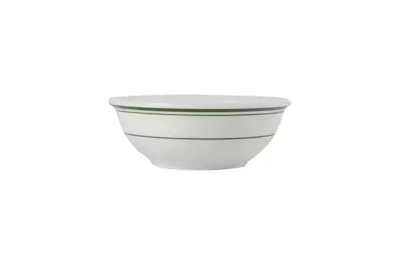 Large white nappie bowl with green trim on white background