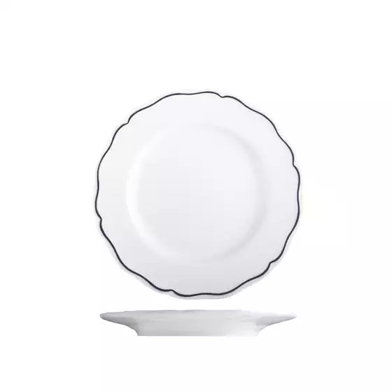 White scalloped round plate with wide rim and blue band on a white background