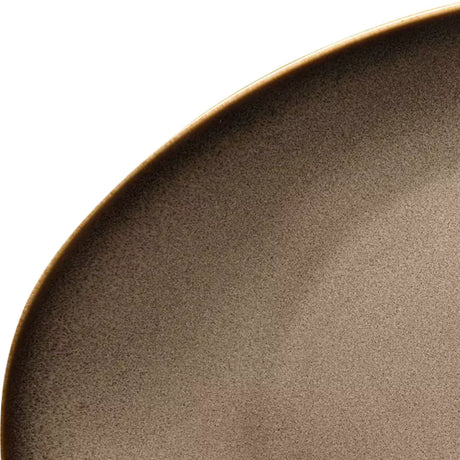 Magnified picture of a rustic bowl's edge on a white background