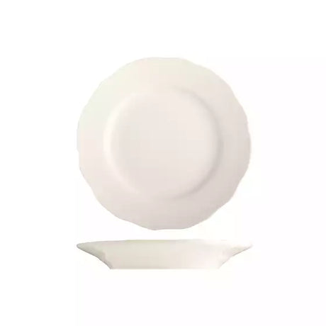 Small white scalloped rimmed plate on white background