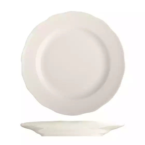 Scalloped round white plate on white background