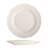 Scalloped round white plate on white background