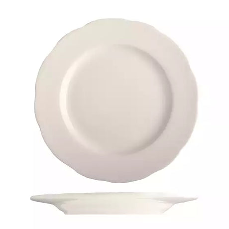 Large round scalloped white plate on white background