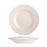 White scalloped soup bowl on white background