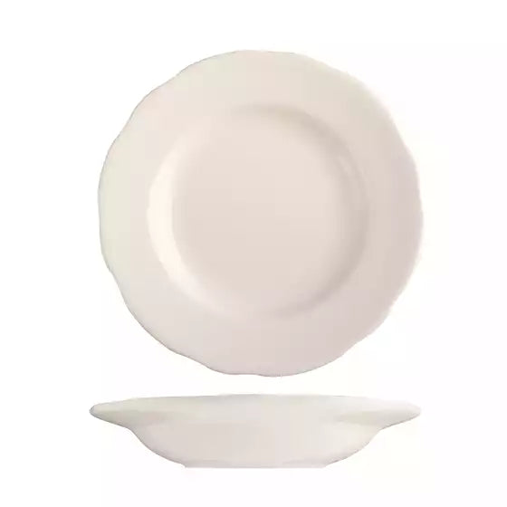 White scalloped soup bowl on white background