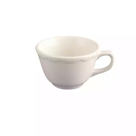 Scalloped white teacup on a white background