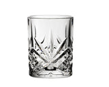 A clear shot glass with a geometric pattern.