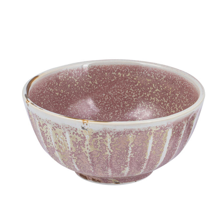 A round, pink porcelain bowl with a scallop design and a metallic speckled finish.