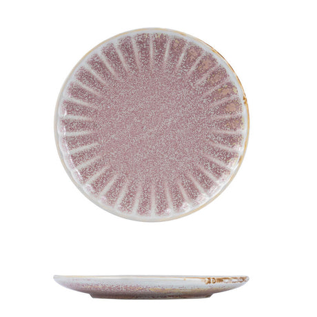 Round pink porcelain plate with a scallop edge design.