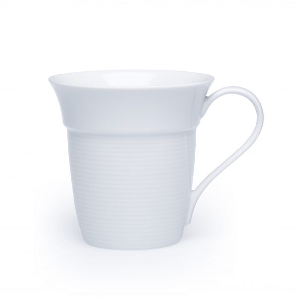 White coffee mug with handle on white background