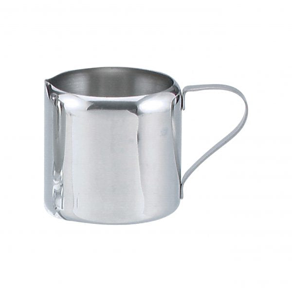 Stainless steel creamer with handle on white background