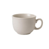 A white ceramic cafe au lait cup with a handle on the right side.