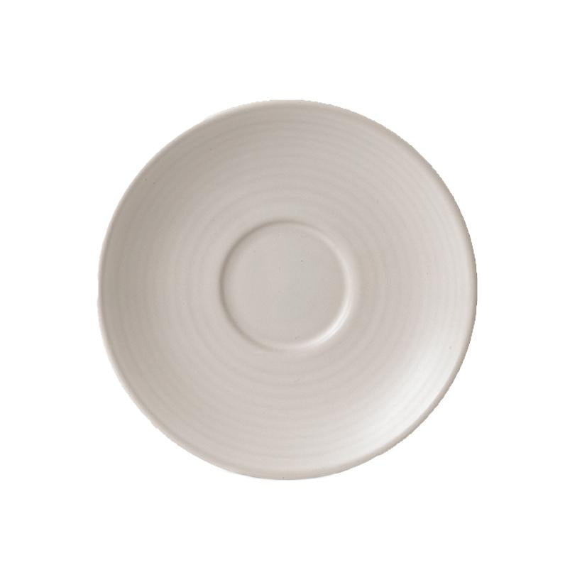 Pearl coloured saucer on white background