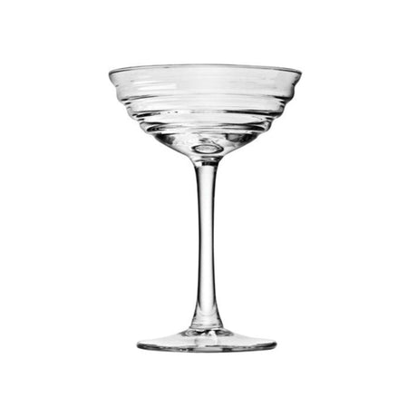 Clear cocktail glass with swirls on white background