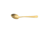 Gold plated tea spoon on white background