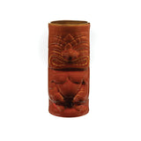 Red tumbler with Tiki design on white background