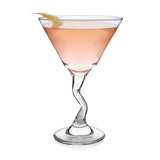 Z Stemmed martini glass with pink liquid on a white background