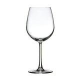 Clear red wine glass on white background