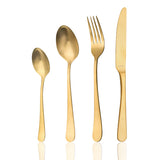 Cutlery set in gold on white background