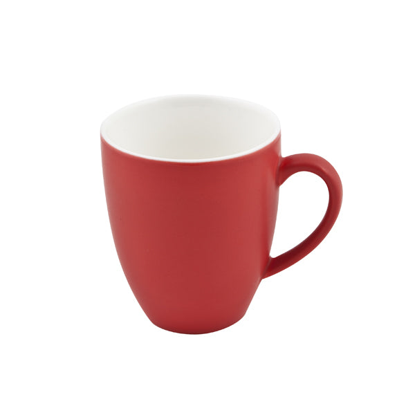 A large red coloured coffee mug on a white background 