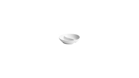 A very small, white round divided dish on a white background