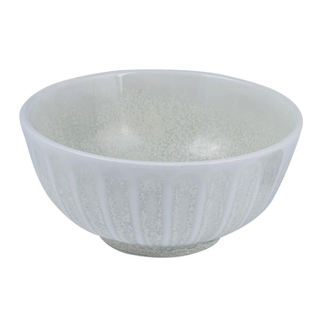 A round porcelain bowl with scallop edges and a muted color palette of grey, green, and white.