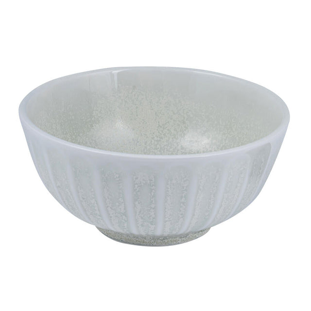 A round porcelain bowl with scallop edges and a muted color palette of grey, green, and white.
